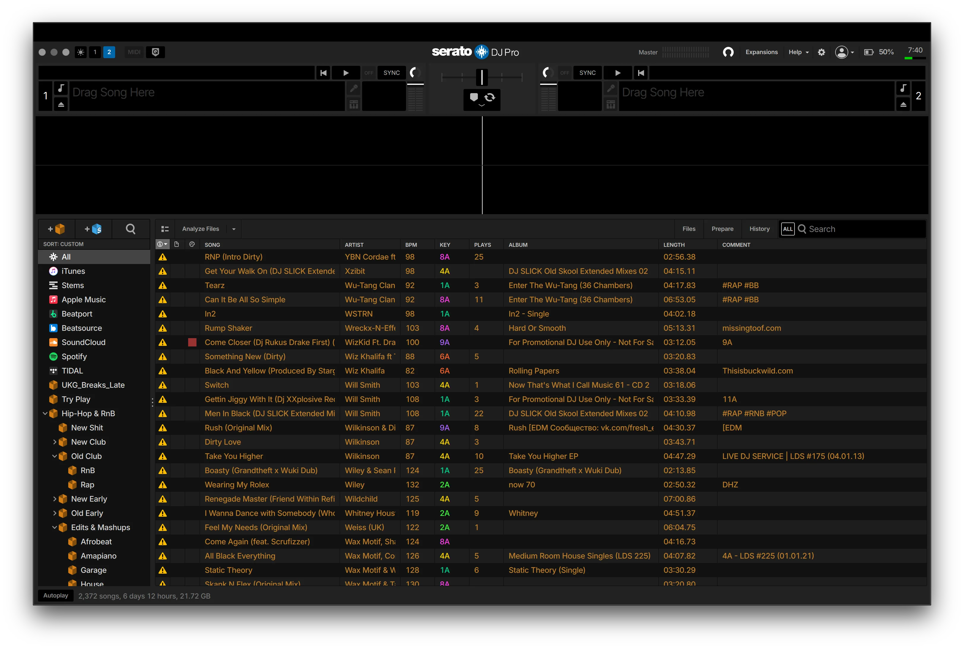 A Serato DJ Pro library with missing-file warning icons on a long run of tracks